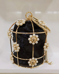 “byrd cage” Clutch Bag